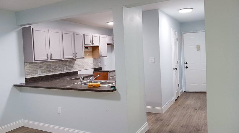 New Renovation. Fully updated kitchen with modern finishes and flooring at The Savoy Apartments, located in Cartersville, GA